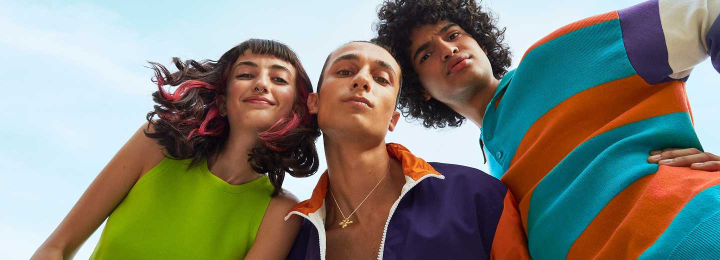 Young people looking down at camera