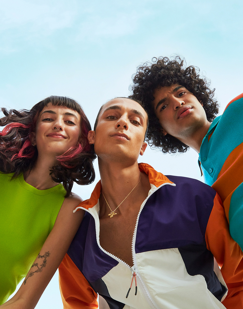Young people looking down at camera