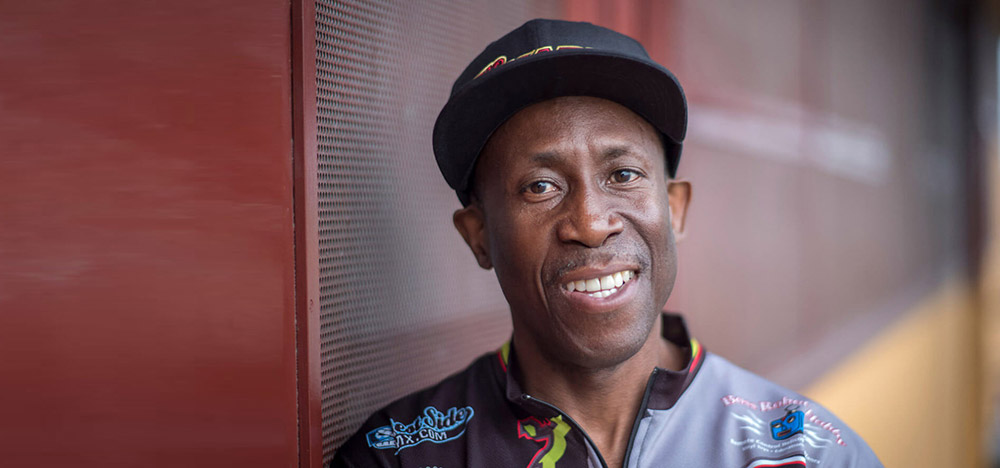 man standing and smiling