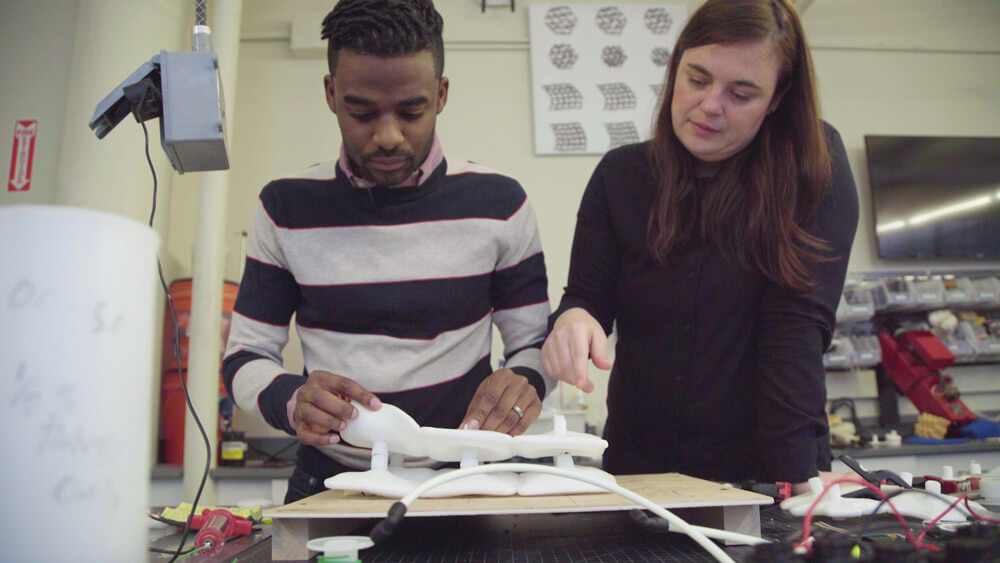 Man and woman working at a table
