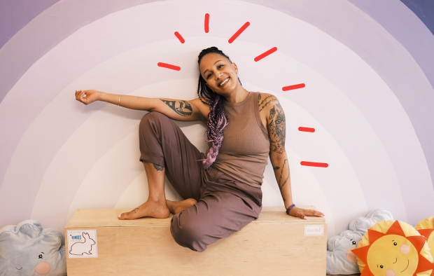 Alex Louise-Jacques sitting on a block