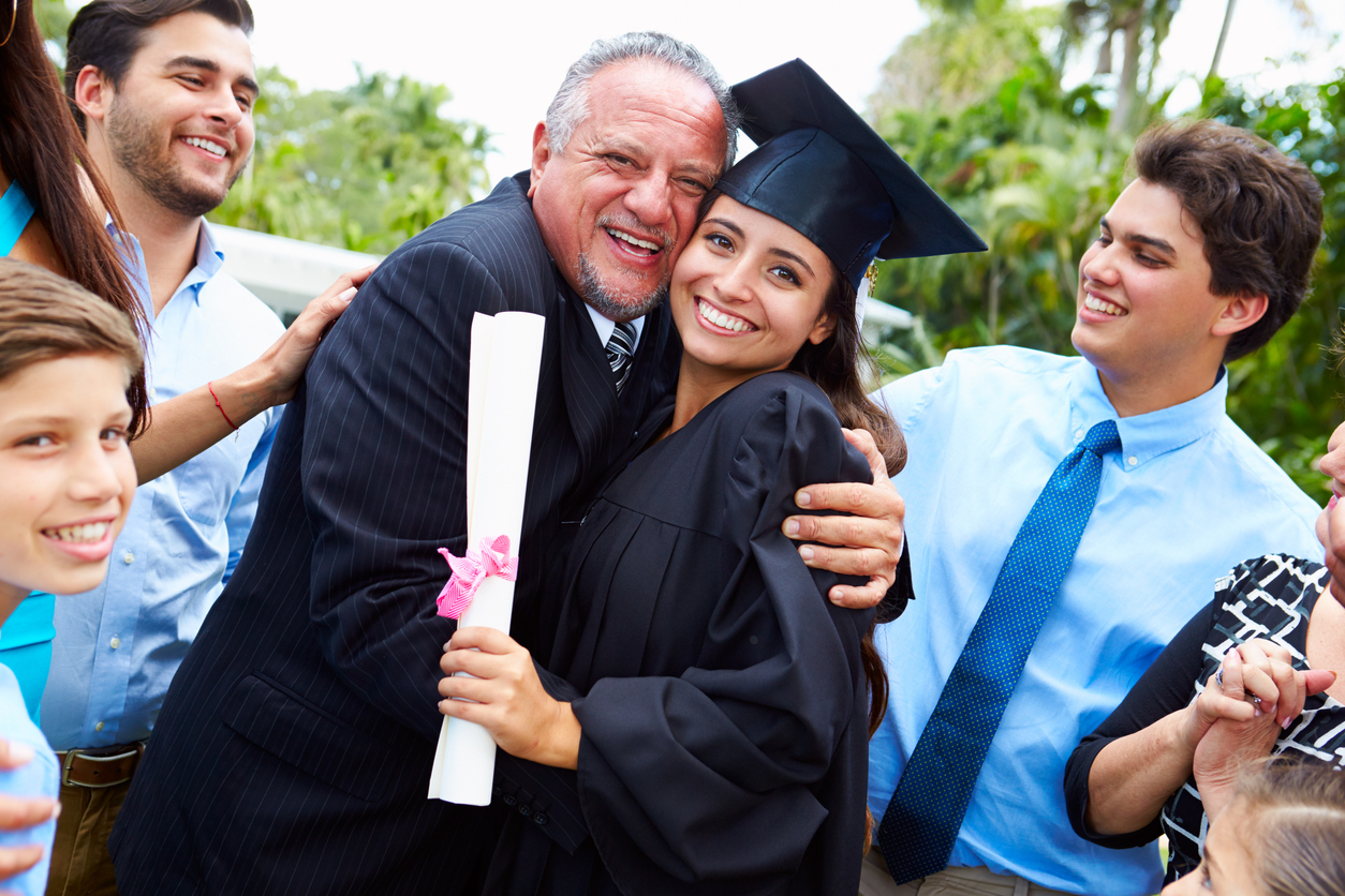A college graduate with family and friends