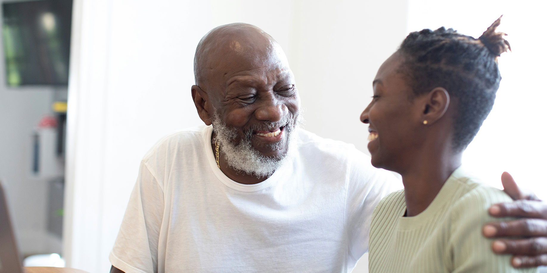 A father and daughter working on a family giving donor advised fund together