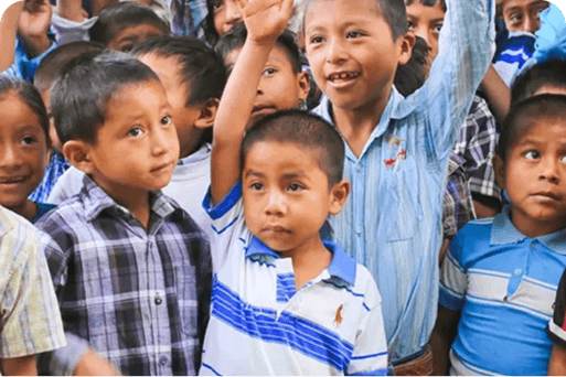 Children raising their hands
