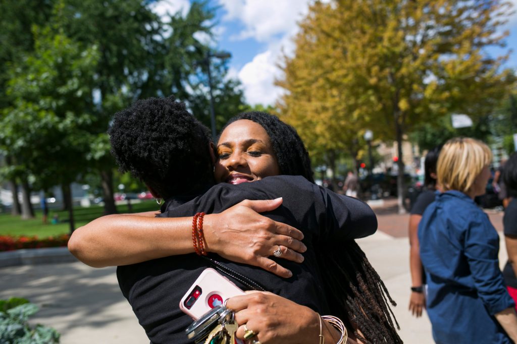 Two women hugging