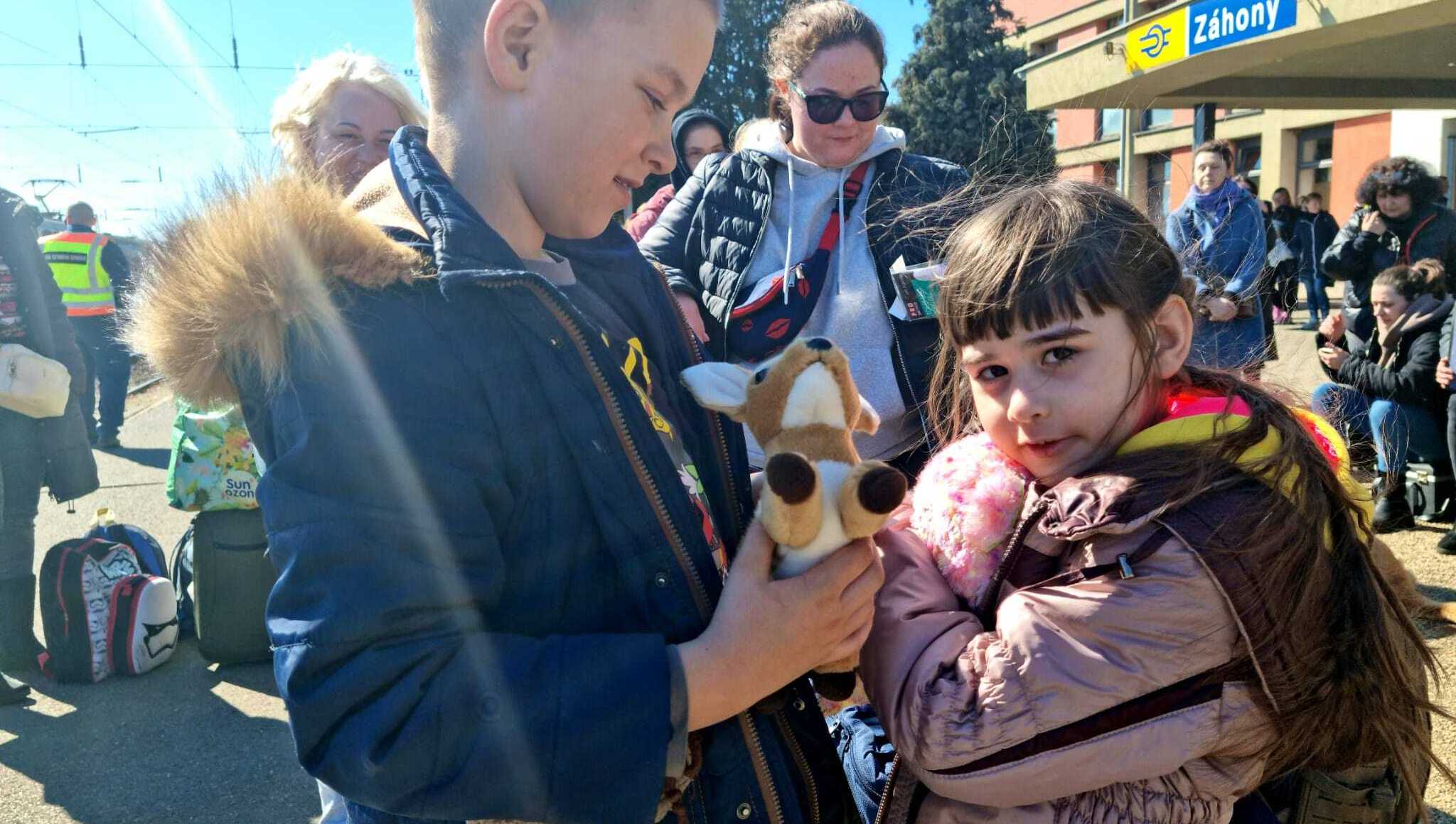 Kids holding their teddies