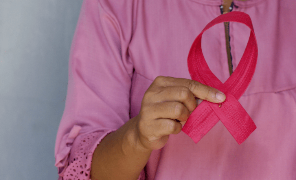 woman holding ribbon
