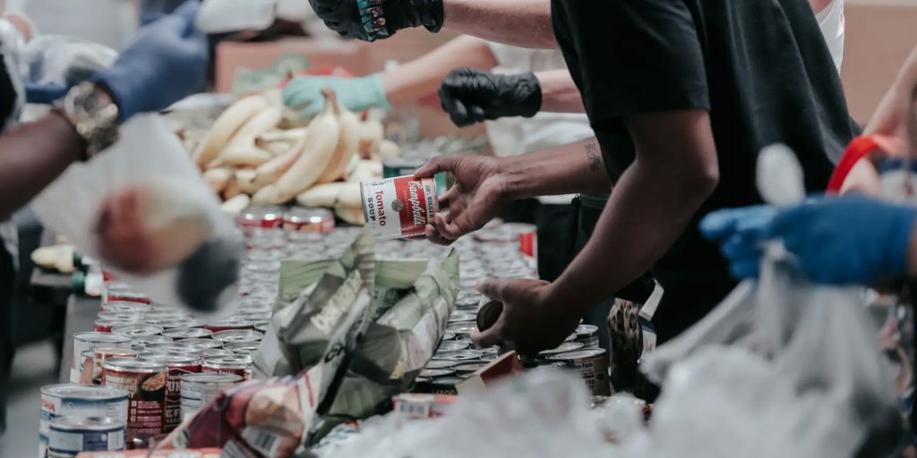 volunteers packing food goods